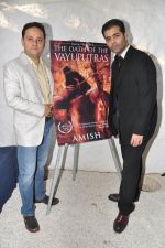 Karan Johar launches the Cover of Amish_s eagerly anticipated 3rd book in the Shiva Trilogy, The Oath of the Vayuputras in Mumbai on 27th Dec 2012 (27).JPG